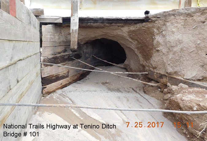 Erosion under a section of National Trails Highway at Tenino Ditch.