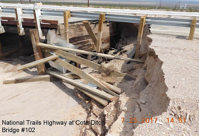 A collapsed section of National Trails Highway at Cota Ditch.